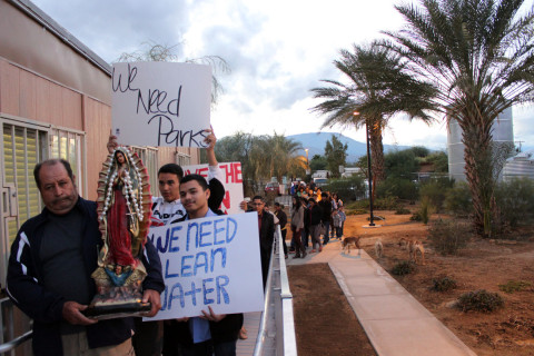 Residents end their Virgen de Guadalupe processional at the San Jose Community Center in Thermal, Calif. on Friday, December 12, 2014. The processional highlighted environmental injustices in the eastern Coachella Valley. Photo: Amber Amaya / Coachella Uninc.