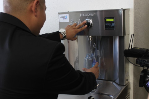 Cástulo Estrada, recently elected to represent division 5 on the Coachella Valley Water District board, tries out the tap station in the San Jose Community Center in Thermal, Calif. on Wednesday, January 28, 2015. Photo: Amber Amaya/ Coachella Unincorporated